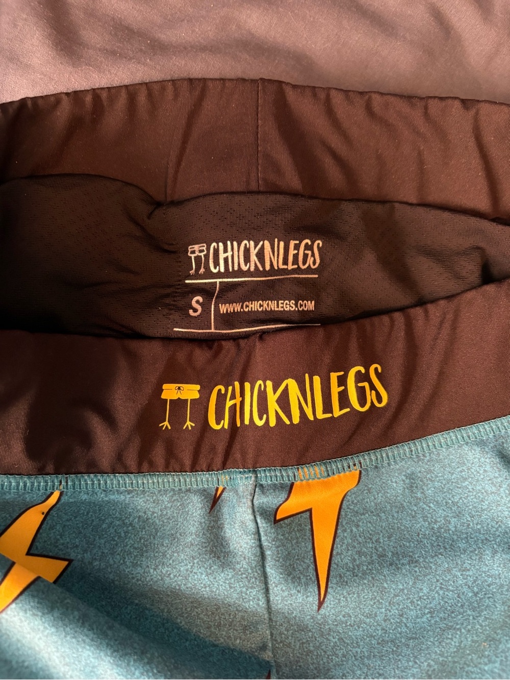 Men’s Chicknlegs Blue Bolts 8” half-tights